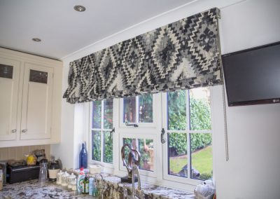 Kitchen window with open roman blind